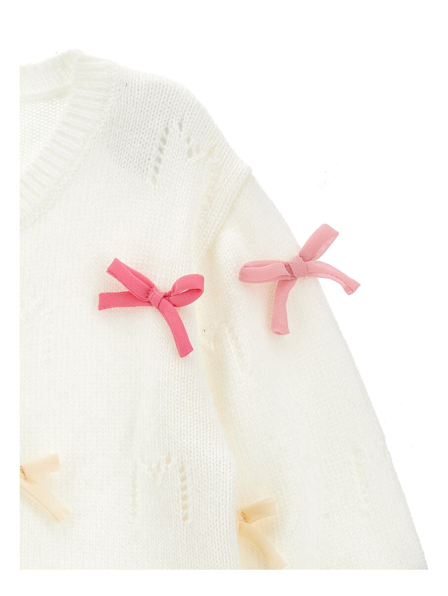 Monnalisa "Strickjacke" mit farbigen Schleifen - Panna