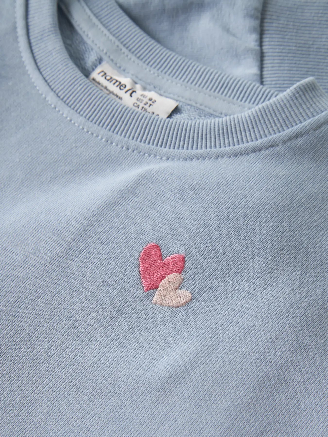 Name it NMFVALLENE LS RLX SWEAT UNB